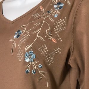 Floral accented tops